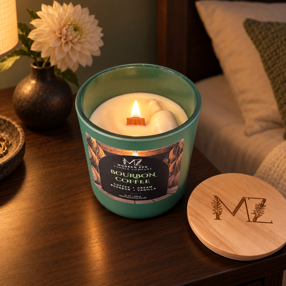 Bourbon Coffee 12 oz soy candle in a matte green glass jar with a crackling wood wick and engraved wood lid