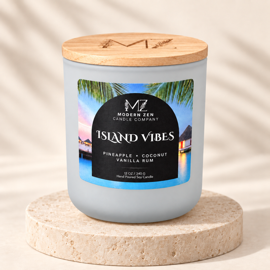 Island Vibes 12 oz pineapple coconut soy candle in a matte sky-blue jar with a wood lid