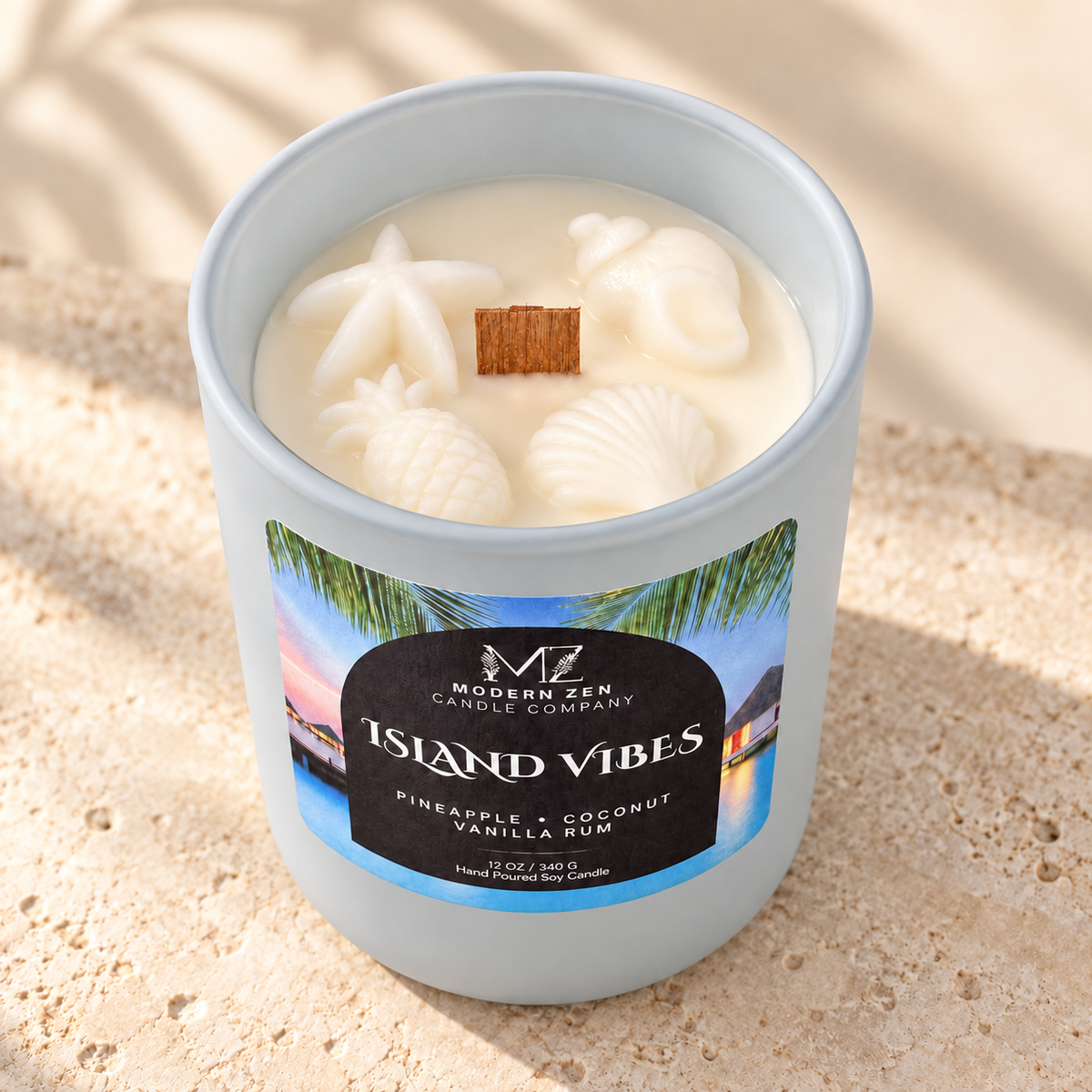 Island Vibes 12 oz pineapple coconut soy candle in a matte sky-blue jar with a wood lid